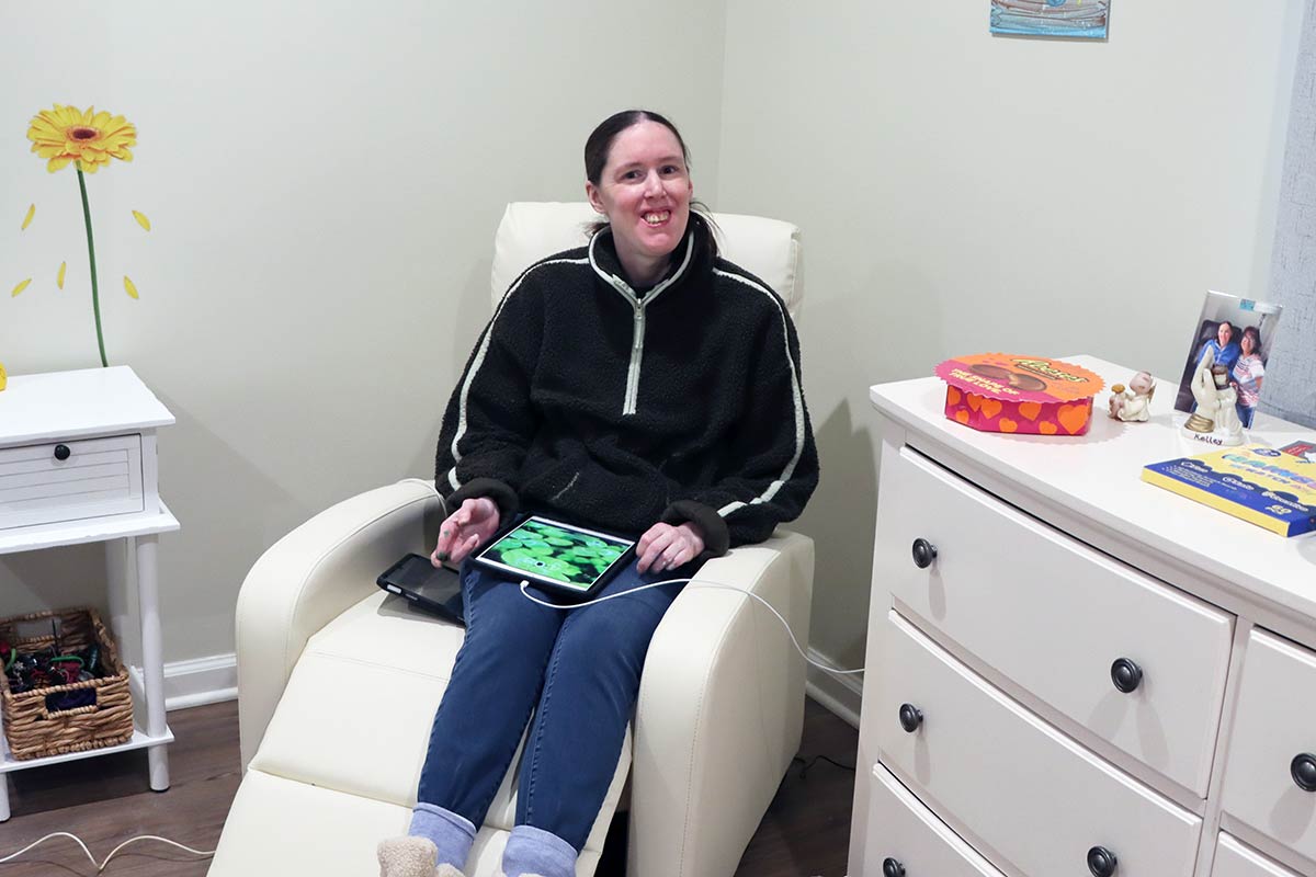Kelley relaxes in her room