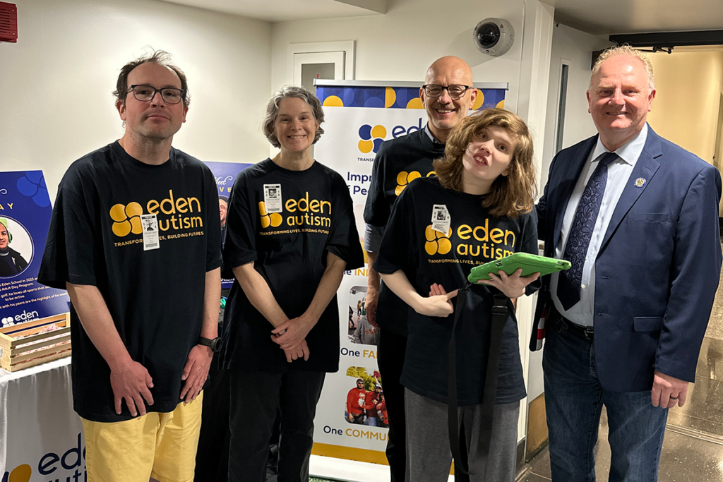 Assemblyman Wayne DeAngelo spoke with participants, staff, and families during an Eden Autism Advocacy Day at the State House.