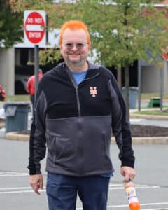 Eden’s Director of IT, Compliance & Privacy Officer John Zahorsky dyed his hair orange as a fundraiser for the Eden Autism 5K!